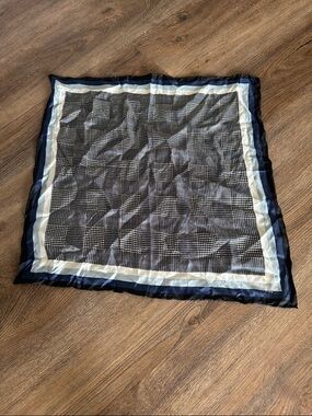 Kate Spade Gold Logo on Navy, Black, and Cream Patterned Scarf